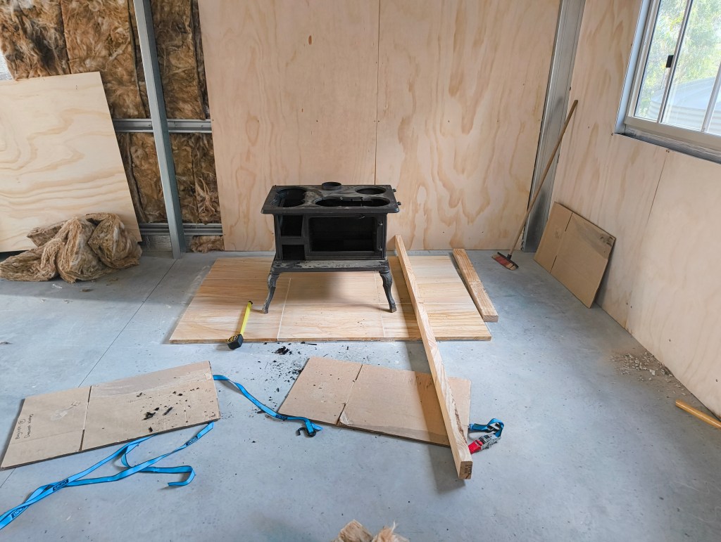 The image is of the sandstone pavers layered out onto the fibre cement sheeting. 