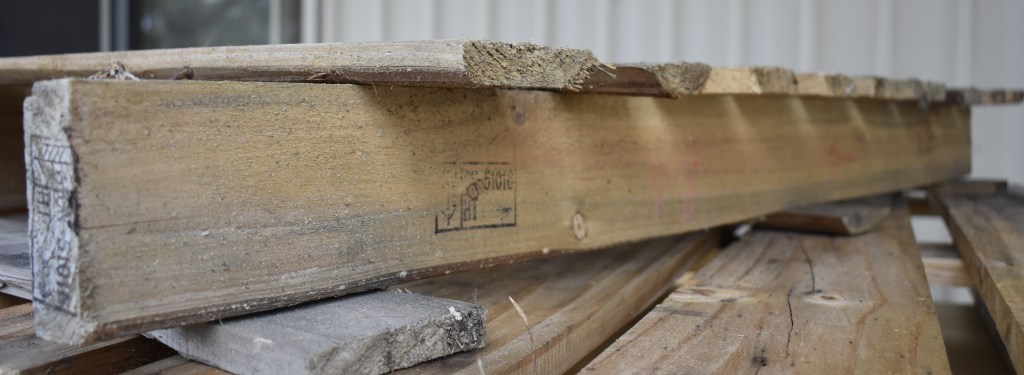 A beam of timber used in making timber pallets.